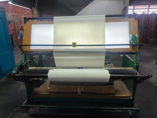 Maquina de revisar tecido