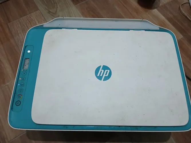 Estou vendendo esta impressora pois nn sei mexer direito mais esta ligando tudo certinho