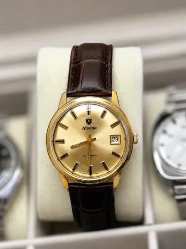 Nivada Compensamatic Vintage Automático Swiss Made Dourado