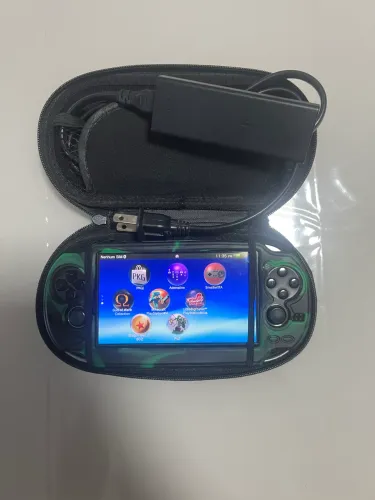 Ps vita desbloqueado, com case,carrgador original do console e capinha