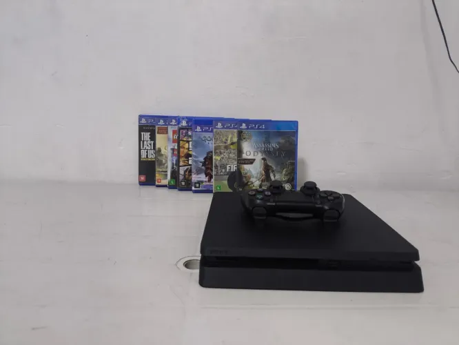 ps4 Slim + 7 disco de jogos