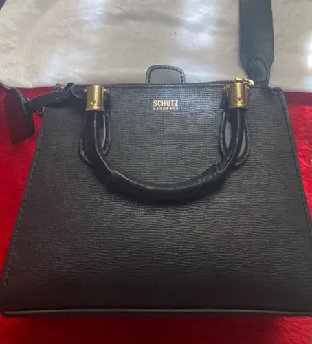 BOLSA SCHUTZ LEGÍTIMA