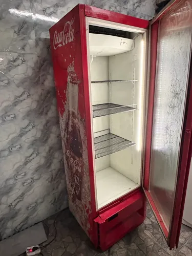 Expositora COCA~COLA