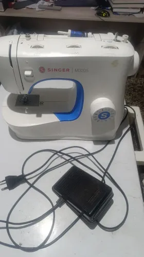 Máquina de costura singer