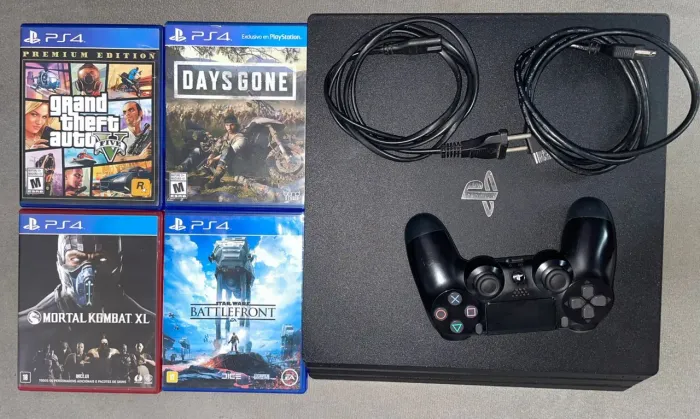 PlayStation 4 pro + 4 jogos, 1700