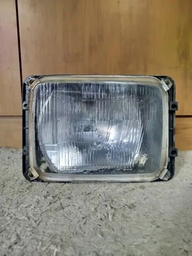 Farol Mercedes 709/710/912 cibié lado esquerdo