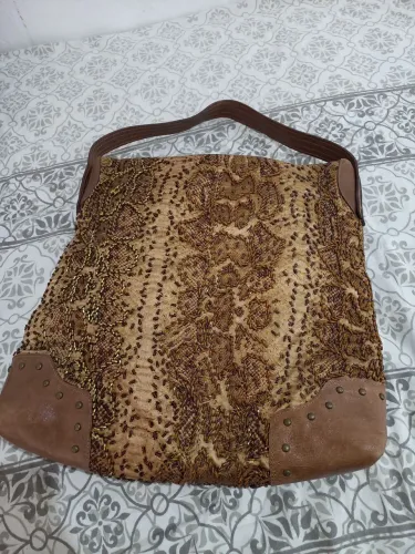 Bolsa toda trabalhada/couro 