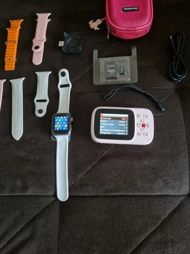 Kit Smartwatch branco + 5 pulseiras + câmera + bag rosa + cartão sd de 32gb com adaptador.