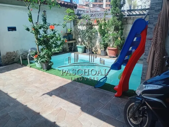 Casa 3 dormitórios C/ piscina à venda - Bairro - Vila Tupi - Praia Grande/SP