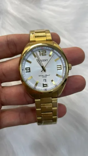 Relógio Dourado Orient com 1 ano de garantia