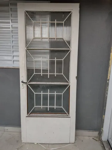 PORTA FERRO COM GRADE 85X2,09 SEM BATENTE  ABERTURA DIREITA 