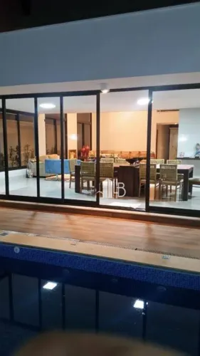 Casa com 4 dormitórios à venda, 349 m² por R$ 5.500.000,00 - Condomínio Bosque Karaíba - U