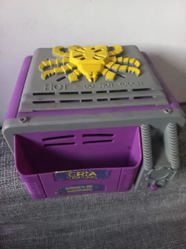 Brinquedo antigo cri criatura da estrela 