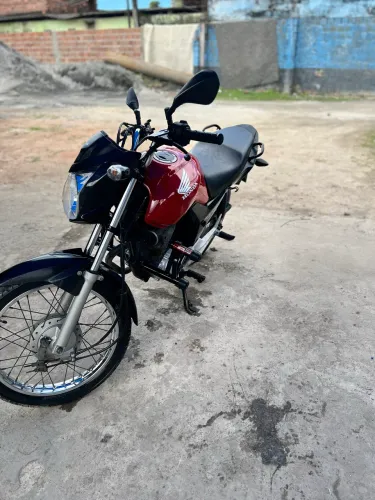 Moto semi nova, único dono