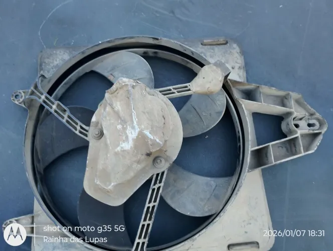 Ventoinha com defletor radiador Fiat uno sem ar condicionado 