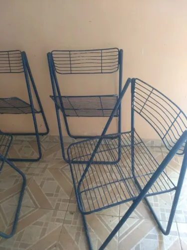Cadeiras de ferro dobráveis