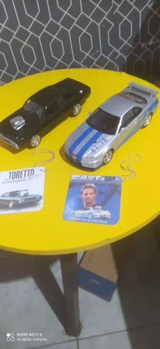 Carros miniatura de velozes e furiosos de ferro abre as portas acende e são 1/24 