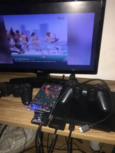 Play 2 funcionando perfeitamente com jogos e 3 controles 