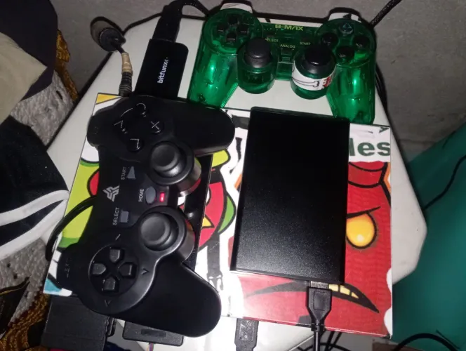 PS2 com HD de 100 jogos de PS2.
