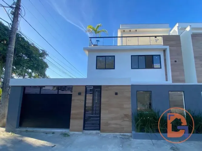 Casa com 3 dormitórios para alugar, 135 m² por R$ 5.669,51/mês - Costazul - Rio das Ostras