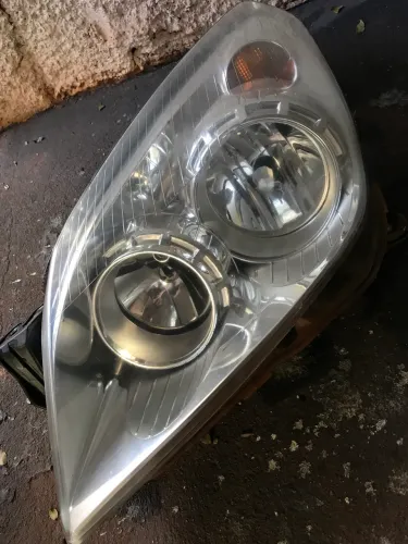 Farol original vectra um lado