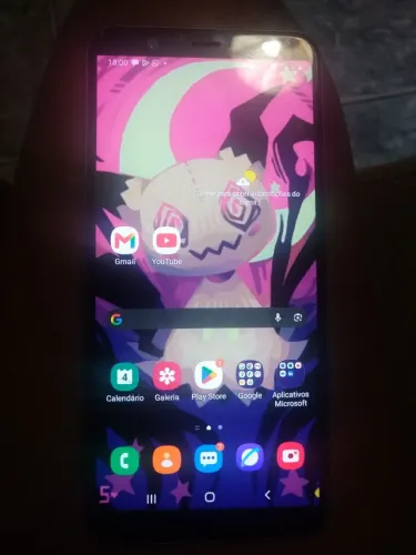 Celular usado, com biometria.