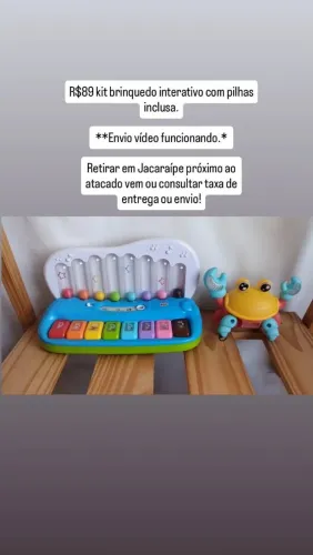 Brinquedos com som e didáticos valor na foto .