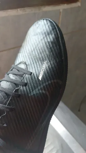 Chuteira society masculina Nike