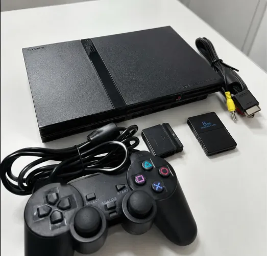 Vendo PlayStation 2 com jogos