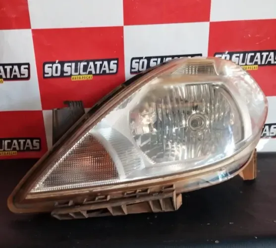 FAROL ESQUERDO NISSAN TIIDA 2006 A 2013 CODIGO 26060E100A