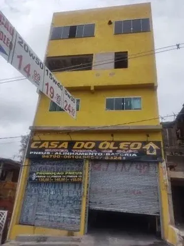 Prédio com 4 casas e 2 salões comerciais à venda, 610 m² por R$ 1.500.000 - Vila Capriotti