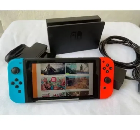 Nintendo Switch V2 Desbloqueado + cartão 258 gigas + par de joycon extra