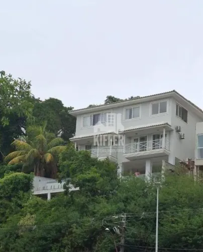 Casa com 3 dormitórios para alugar, 350 m² por R$ 12.956,60/mês - Camboinhas - Niterói/RJ