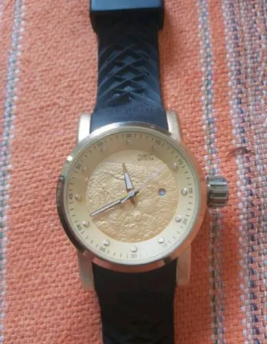 Relogio invicta dragão dourado