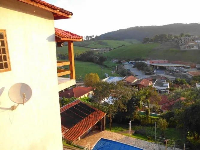 Casa com 3 dormitórios à venda, 272 m² por R$ 890.000 - Centro - Morungaba/SP