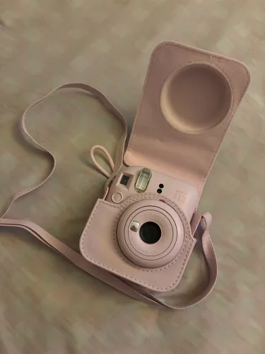 CaMERA POLAROID ROSA COM CAPA E 7 FILMS