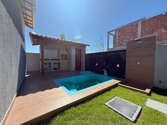 Casa com 2 dormitórios , piscina em condomínio à venda, 120 m² por R$ 250.000 - Unamar (Ta