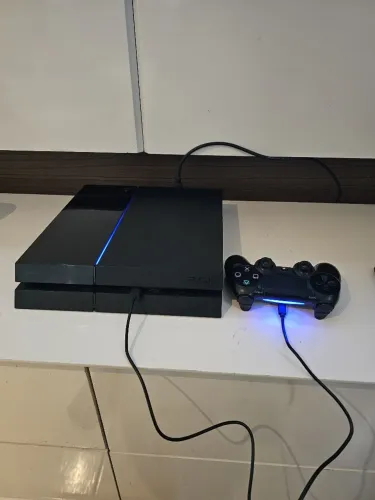 Ps4 Funcionando perfeitamente <br><br>Carregador original <br>Funcionando no Carregado