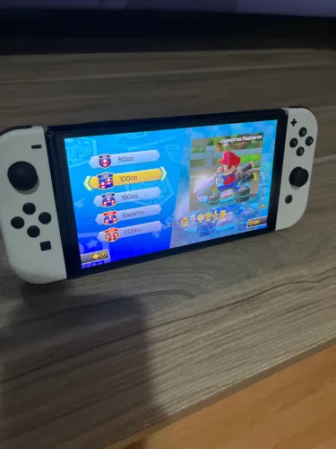 Nintendo switch oled desbloqueado +sd128Gigas com 5 jogos