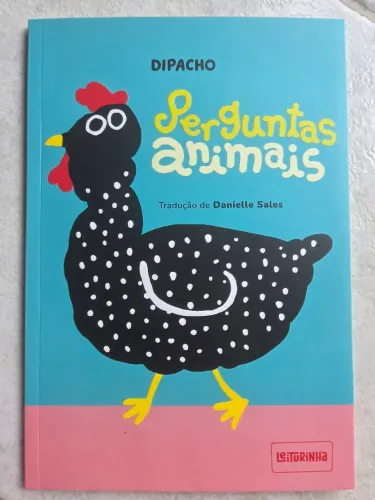 Livro "Perguntas Animais" em excelente estado de conservação 
