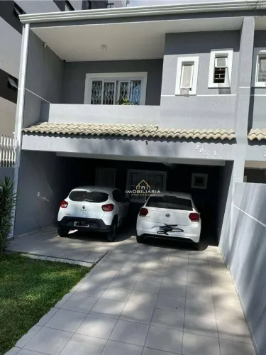Sobrado com 3 dormitórios à venda, 154 m² por R$ 835.000,00 - Novo Mundo - Curitiba/PR