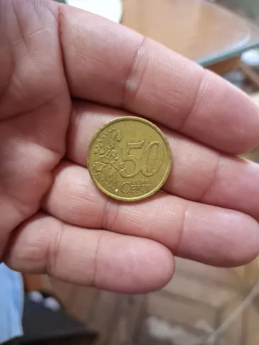 Souvenir - moeda de 50 centavos de Euro