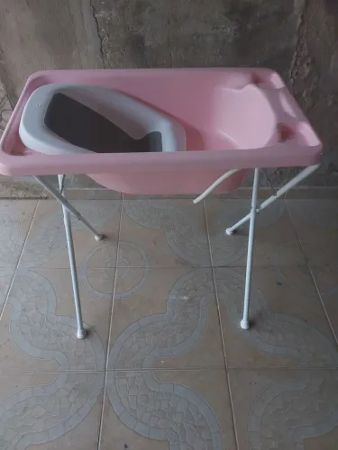Banheira e carrinho de bebê