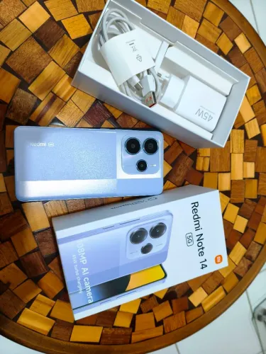 Vendo celular note 14 5g com carregador e capinhas 