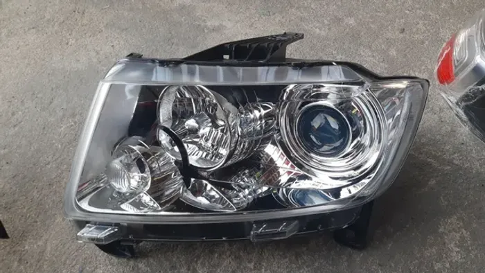 Farol da Grand Cherokee