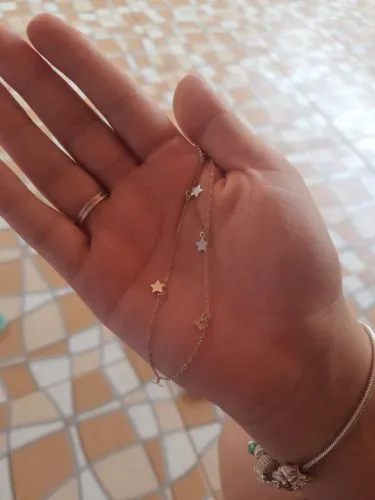 Tornozeleira de prata com estrelas 