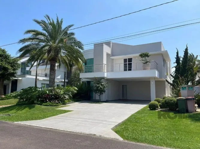 Casa de Condomínio em Atlântida Sul