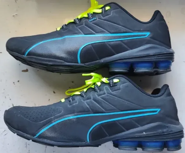 tênis Puma Voltage 180 SL BDP tamanho 38 na cor preto com detalhes em azul e verde limão