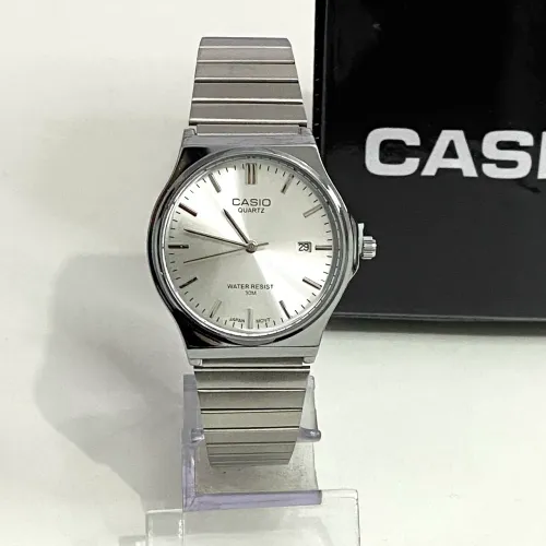Relógio casio vintage analógico prata novo 