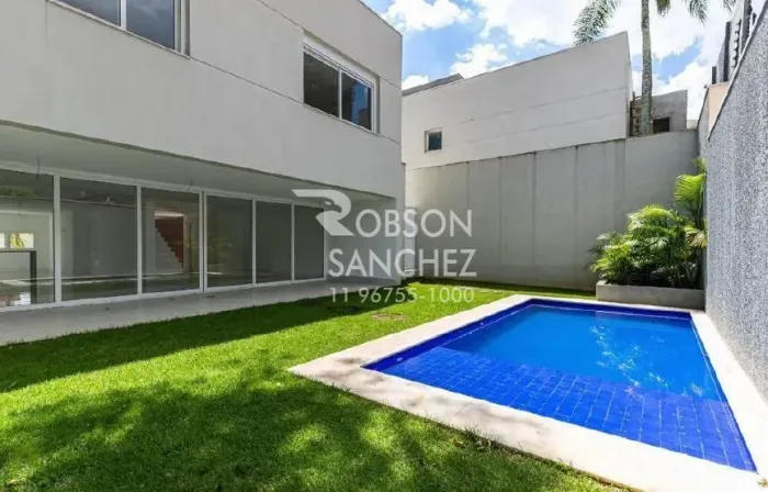 Casa de condomínio para venda na Granja Julieta com 490m², 4 suítes, 5 vagas, jardim e pis